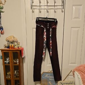 Women's Burgundy Jeans with Floral Belt
